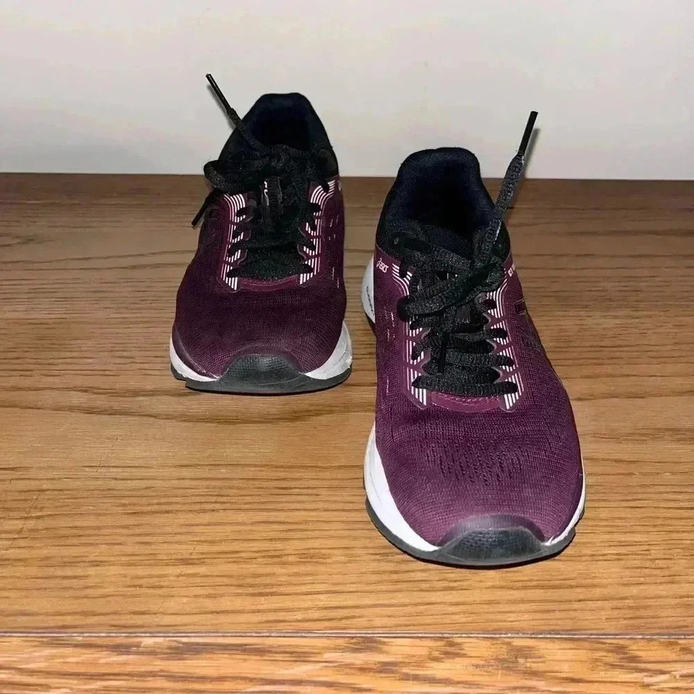 ASICS women’s athletic shoes burgundy in color